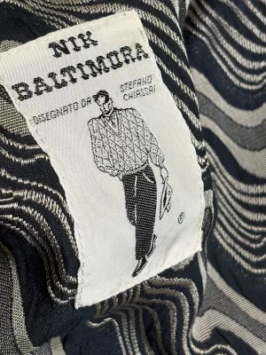 Black long jacket with wavy print