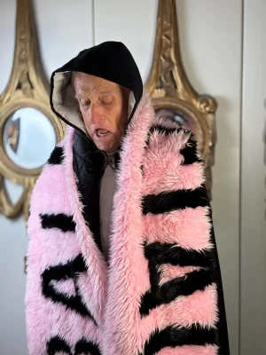 pink faux fur stole with logo