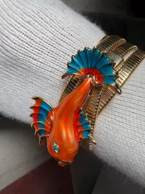 Gold chain with painted fish